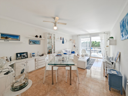 Apartment with sea views, large terrace, parking, and storage room – Canyelles Beach