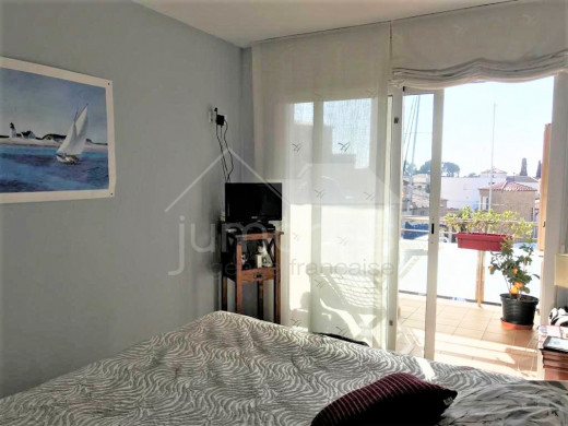 Apartment with canal views, community pool and parking