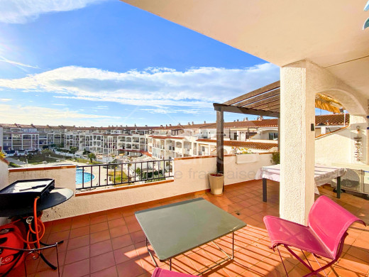 Appartement avec de belles vues, grande terrasse et parking à Empuriabrava