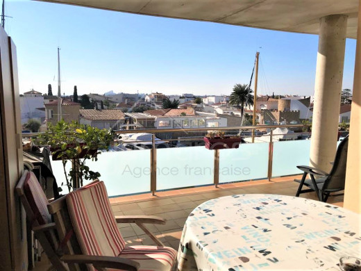 Apartment with canal views, community pool and parking