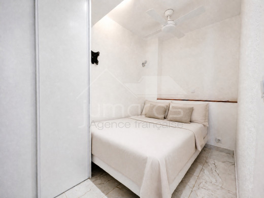 Flat with a side sea view, swimming pool and tennis court in Santa Margarita, Roses